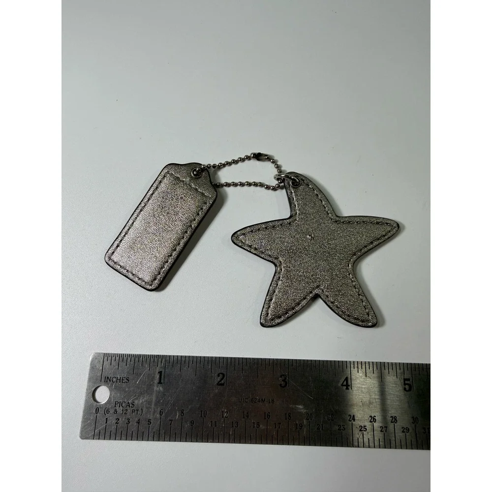 Coach Metallic Silver Leather Star Bag Charm and Logo Hangtag Keychain Accessory